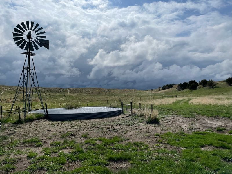 Windmill, with cloudy sky in the Sandhills, western Nebraska