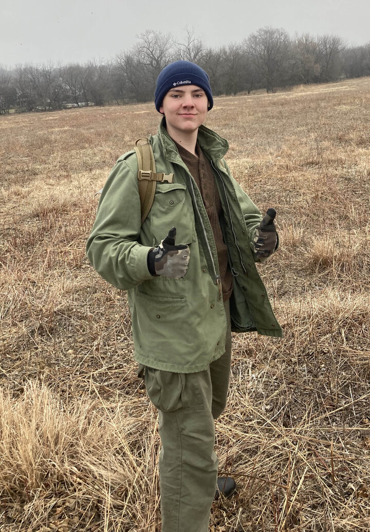 photo of Dean Bissell standing in field