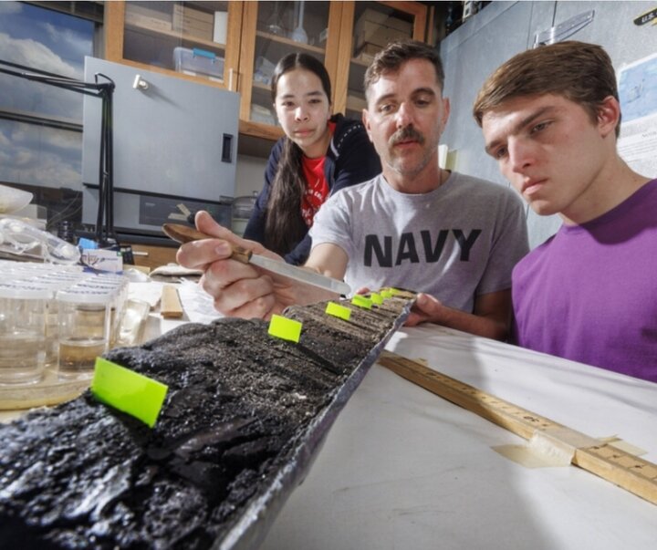 Jasmine, Jim and Joe examine charcoal samples 